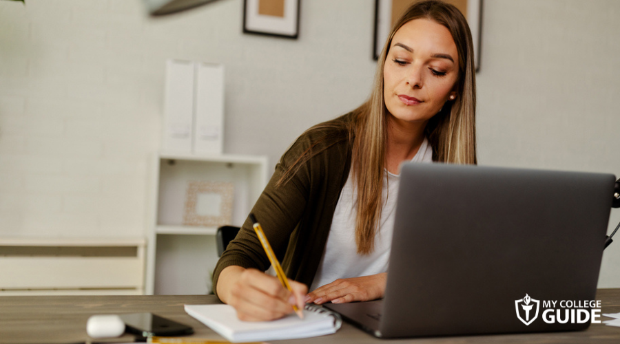 Student mom writing options on what career path to take