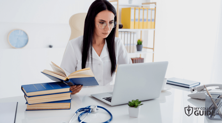 medical assistant looking on patients records online