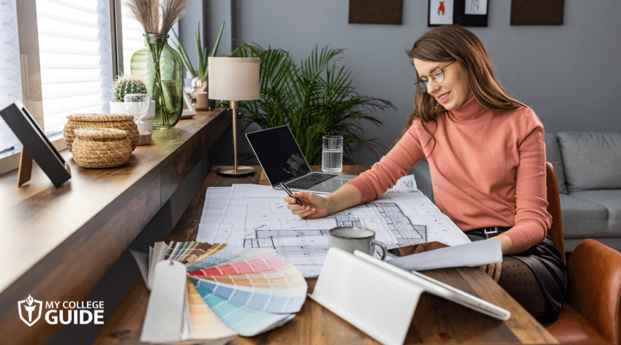 female architecture working on client's plan
