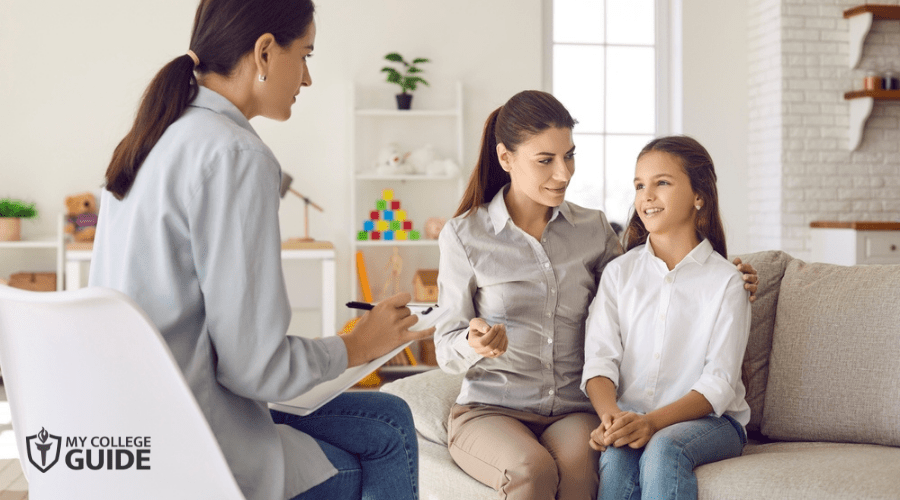 Counseling therapist in a therapy session with a girl