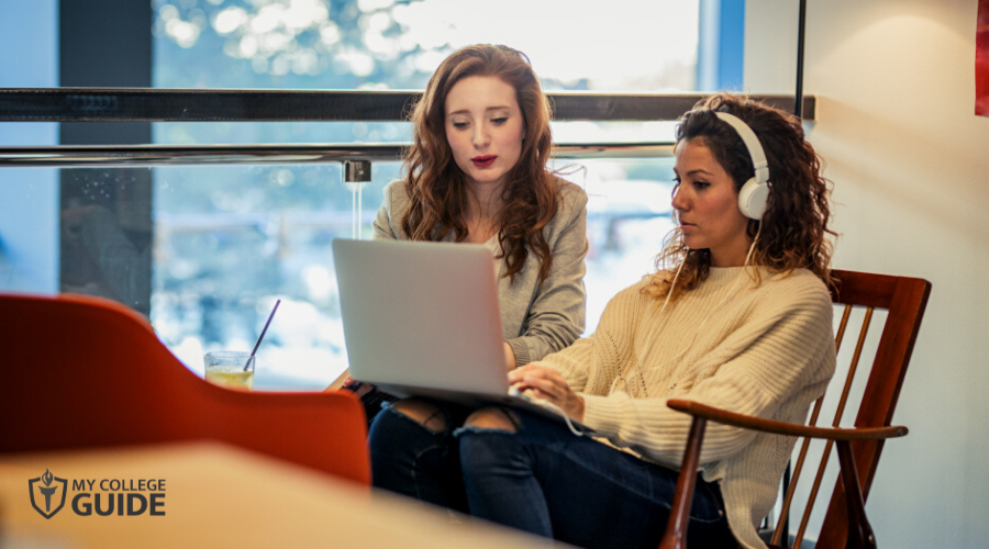 Two students taking synchronous online classes