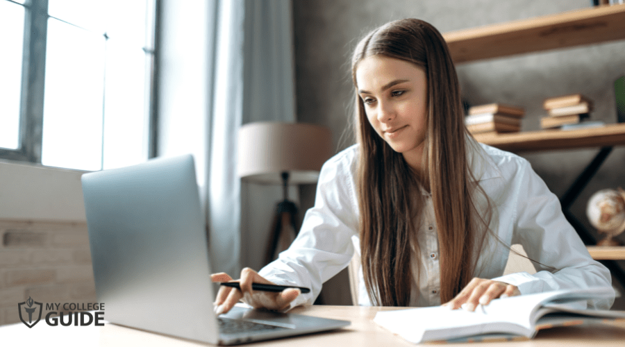 female student doing online class at home
