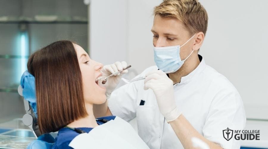 Dental Hygienist in a session with a client