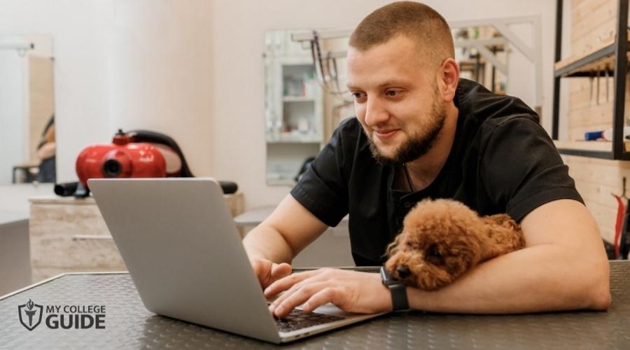 Man getting his Veterinary Degree online
