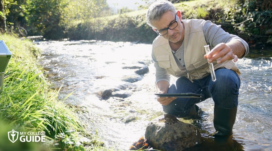 Environmental Scientist collecting water sample