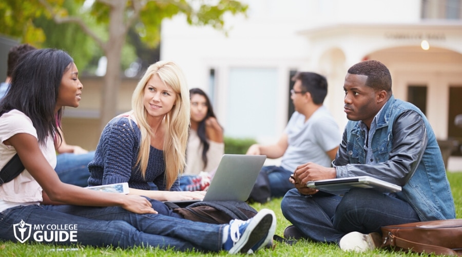Students talking on the campus grounds