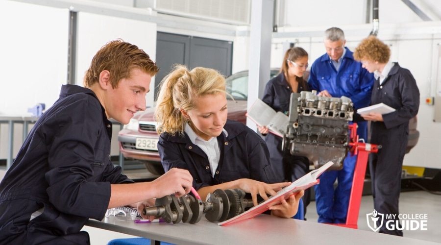 Students in a Trade School learning automotive