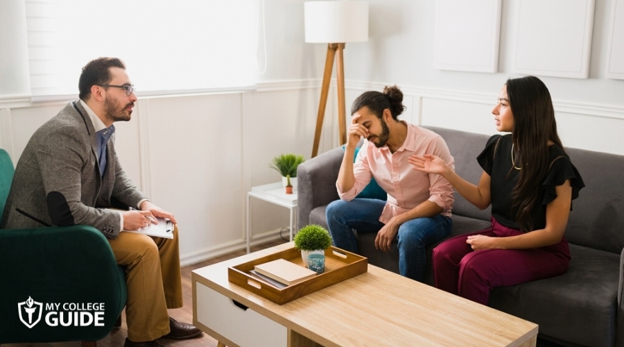 Marriage and Family Therapist discussing with a couple