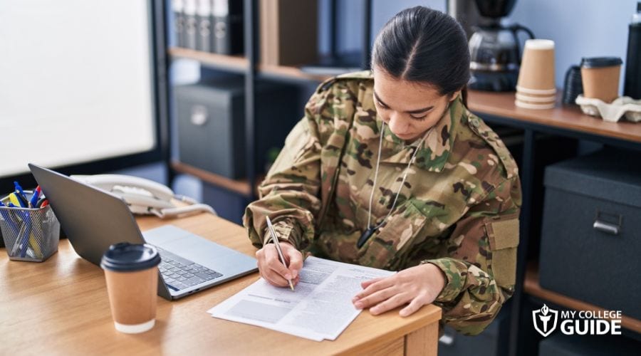 Woman preparing requirements for Military Friendly College admission