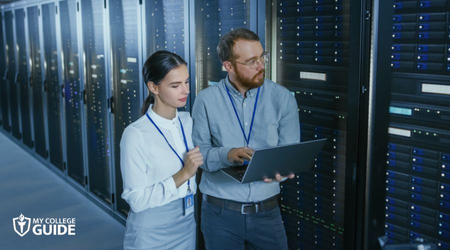 Database administrators working in the server control room