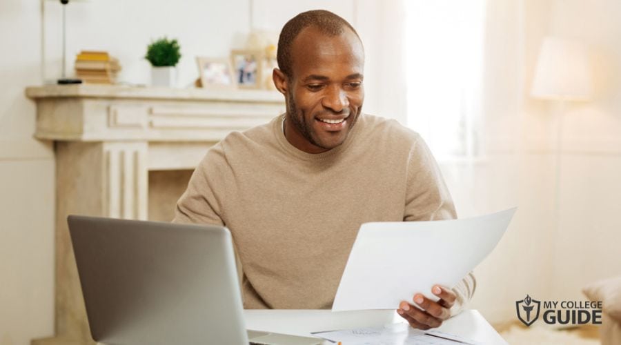 Man preparing for Maryland College Online requirements