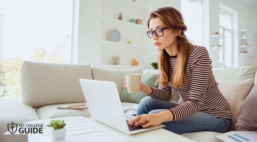 Woman taking Finance Degree Online