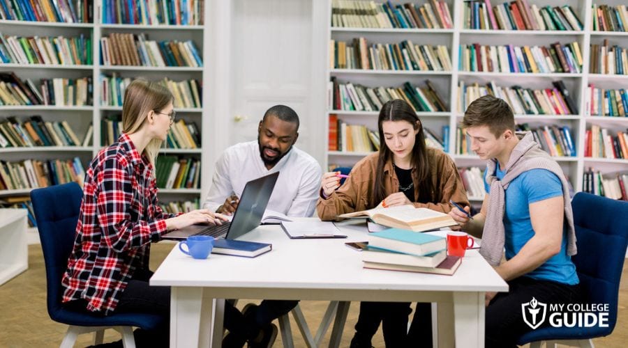 college students studying in library