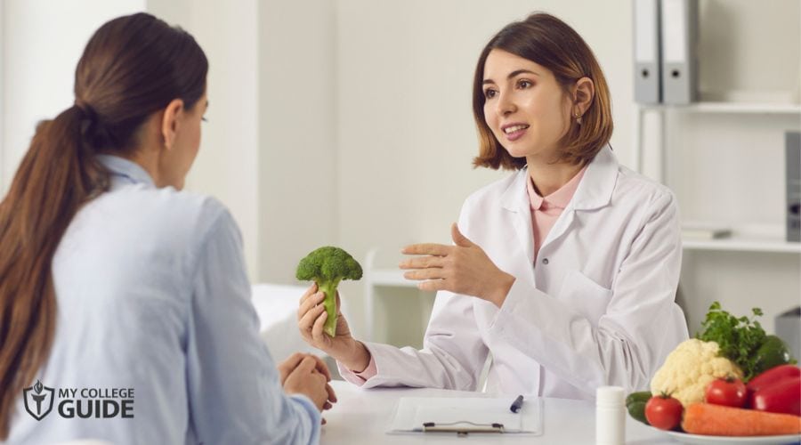Nutritionist educating a patient