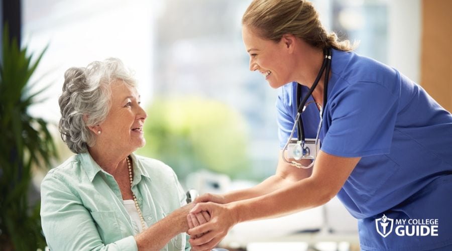 Nurse greeting an elderly patient